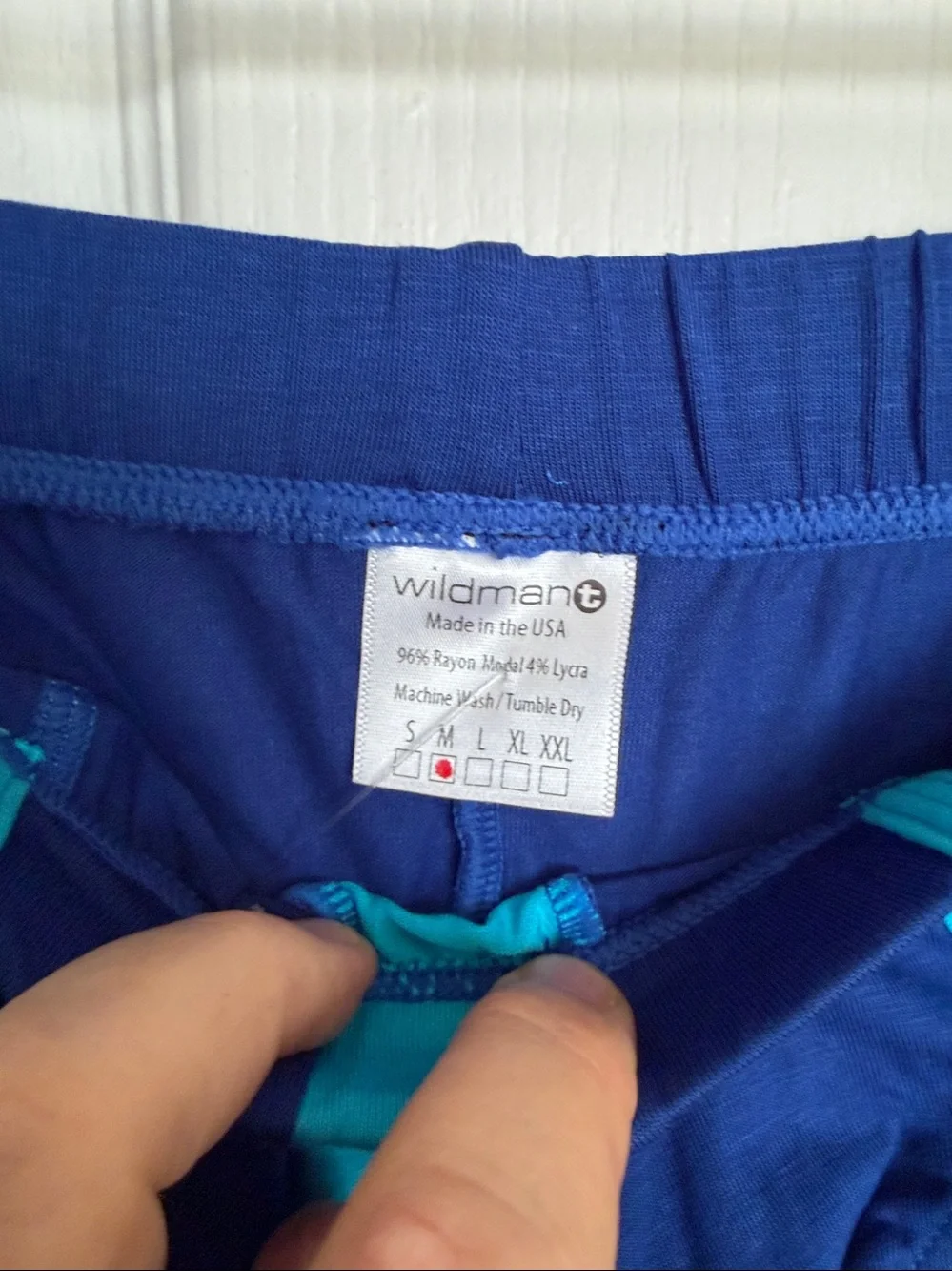 New with tags.  Wild Man - Briefs, Swim.  Blue and Teal.